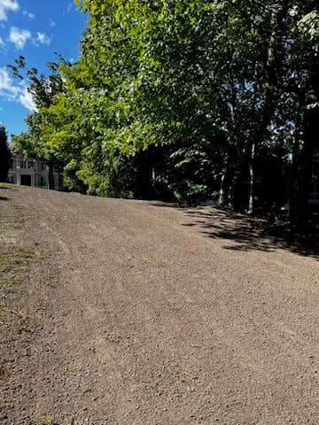 Transforming Overgrown Land into Lush Lawn in Andover image