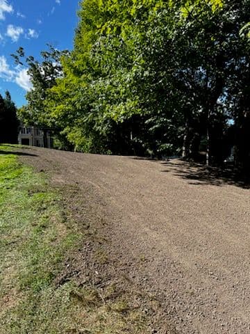 Gallery photos for Transforming Overgrown Land into Lush Lawn in Andover: Image #1